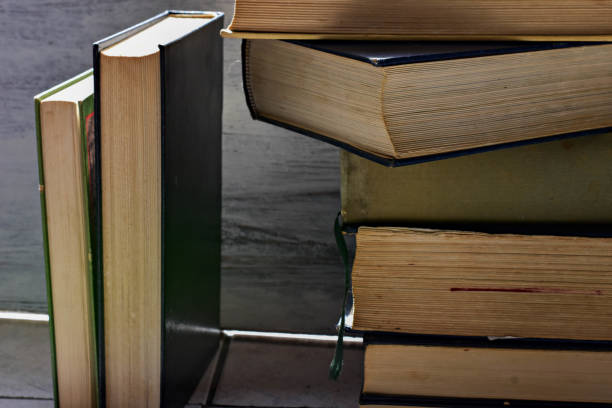 istock a stack of old dusty books stacked on top of each other 943292852