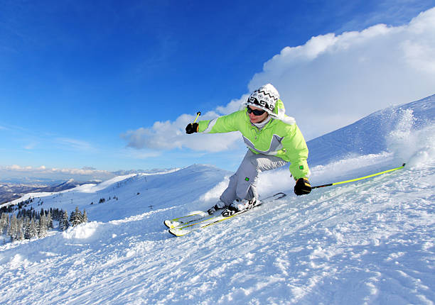 istock Young woman skiing on the mountains 94329535