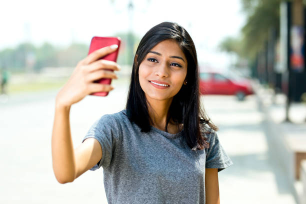 istock Beautiful woman taking selfie 943295464