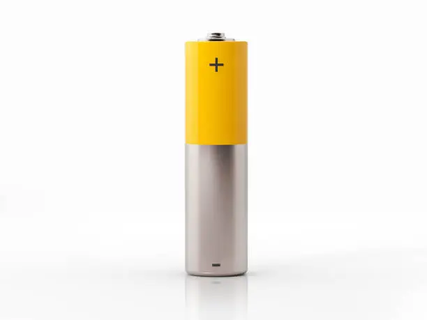 AA size yellow and silver colored battery on white background. Horizontal composition with copy space.