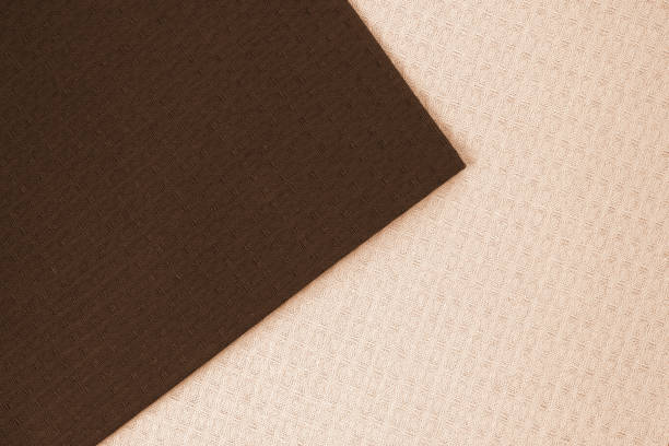 istock Kitchen napkins textile background with dark and light colors 943296904