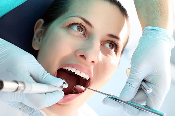 istock Woman patient at the dentist. 94329880
