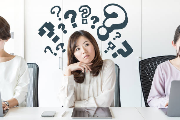 istock Young asian woman having questions. 943301022