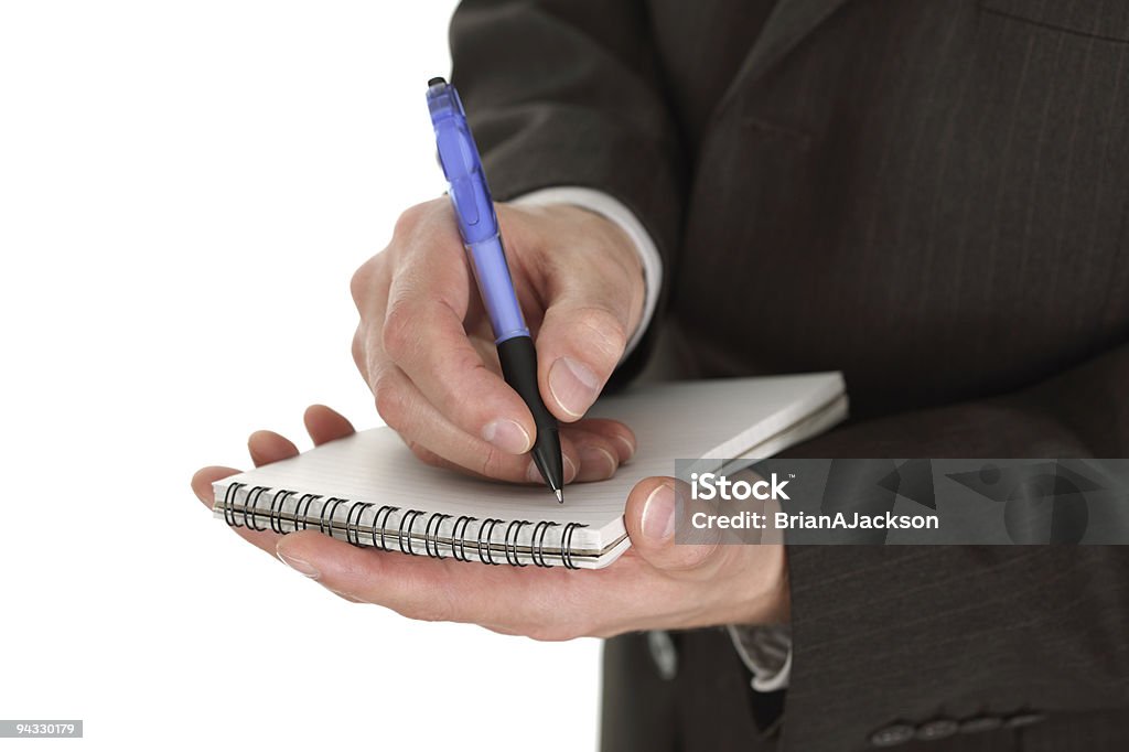 Empresário escrevendo notas - Foto de stock de Agenda pessoal royalty-free