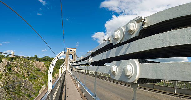 A close-up of one of the Queensferry Crossing bridge's three concrete towers, with steel cables radiating from the tower.