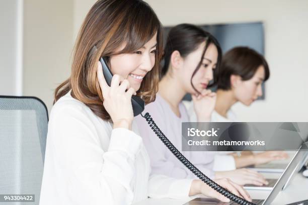Young Woman Making A Call Stock Photo - Download Image Now - Using Phone, Telephone, Office