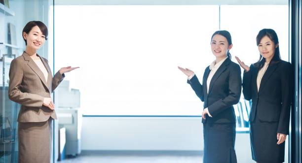 Group of woman standing at the entrance of the office. Group of woman standing at the entrance of the office. affirmative action photos stock pictures, royalty-free photos & images