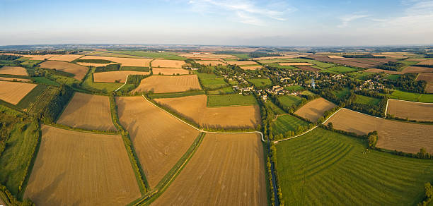 istock Aerial panorama over rural patchwork quilt of farms crops fields 94330720