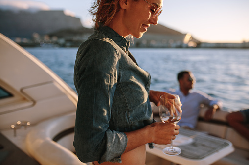 Woman Partying On Private Boat With Friends Stock Photo - Download ...