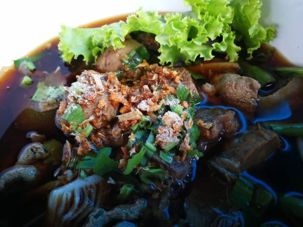 istock pork and beef in Thailand herb soup with bean trees 943320088