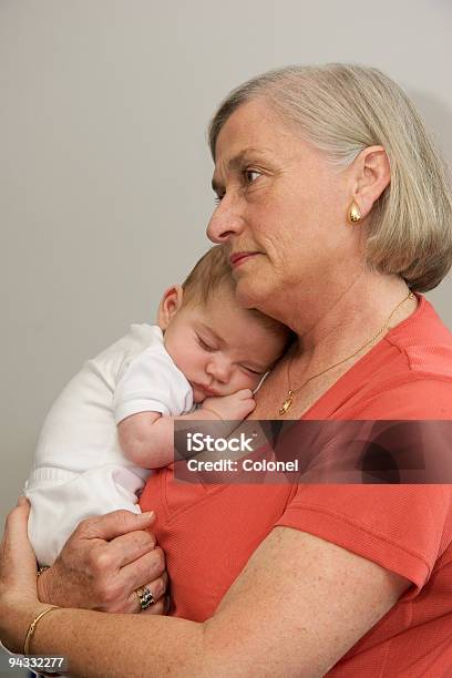 Grandma And Sleeping Baby Stock Photo - Download Image Now - Adult, Baby - Human Age, Care