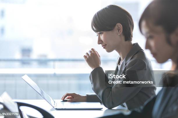 Businesswomen Working In The Office Positive Workplace Concept Stock Photo - Download Image Now