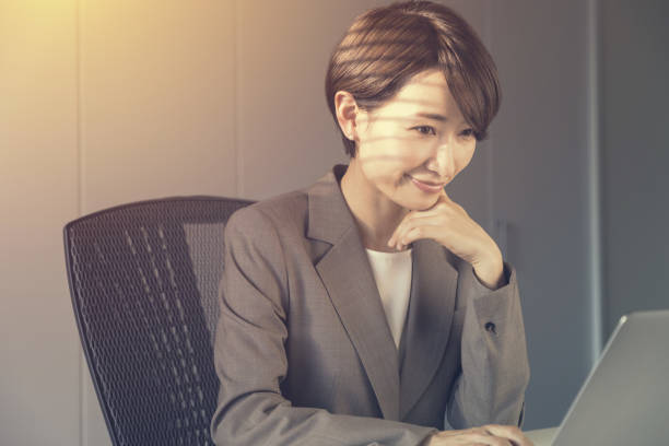 istock Middle aged woman working in the office. 943327302