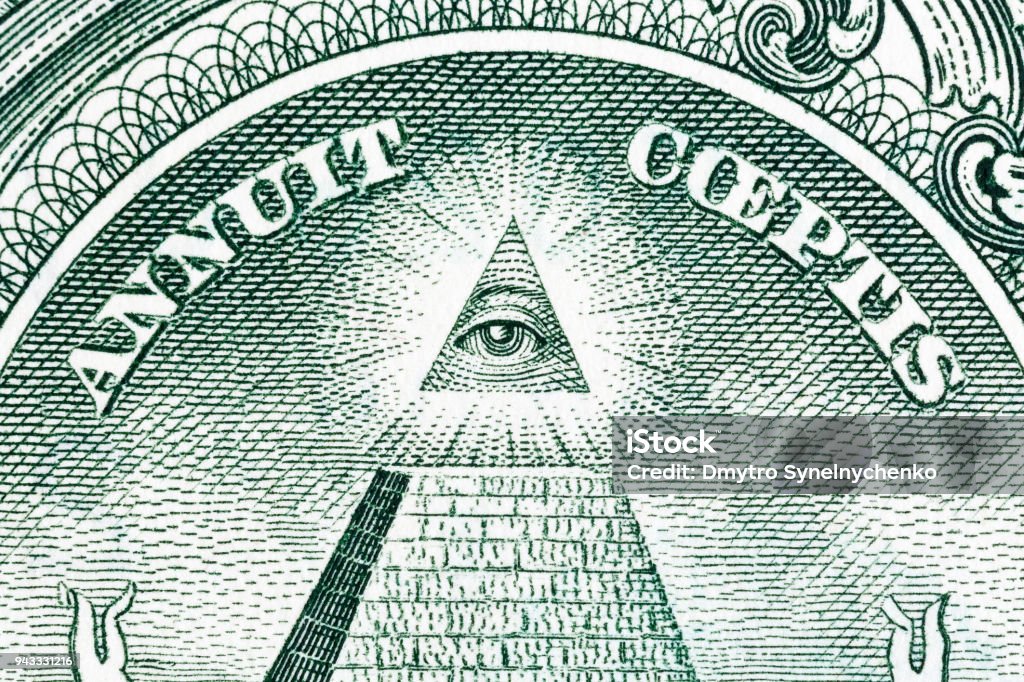 Great press of the USA. Big pyramid with an eye of the architect Great press of the USA. Big pyramid with an eye of the architect of the Universe. Secret signs on the Masonic order. US Paper Currency Stock Photo