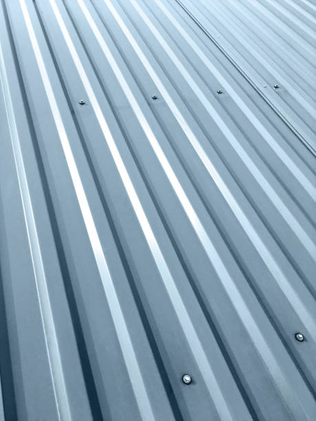 istock corrugated grey metal roof with rivets as background 943331244