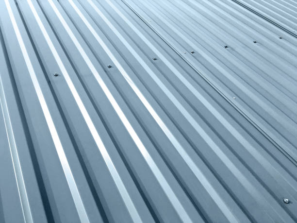 istock corrugated grey metal roof with rivets 943331364