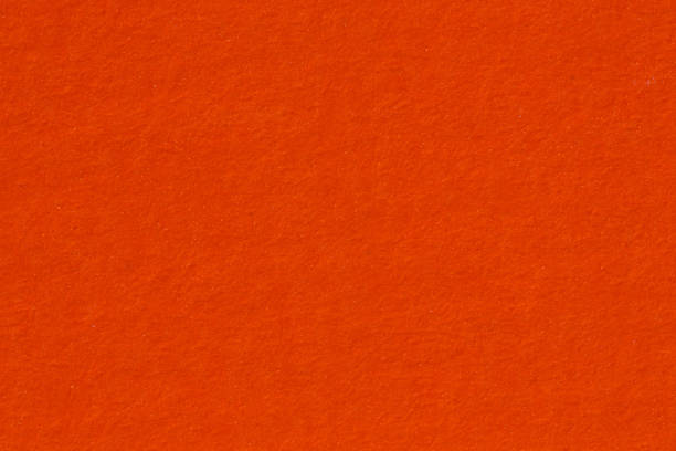 istock Background of orange paper texture, macro shot 943331650