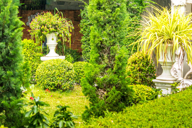 istock Gothic flower pot in garden. 943334228