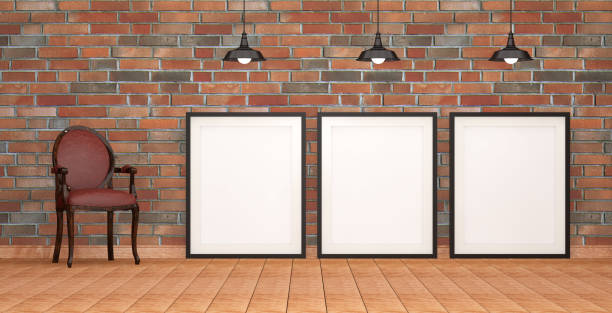 istock Empty living room with blank frames and armchair 943339662