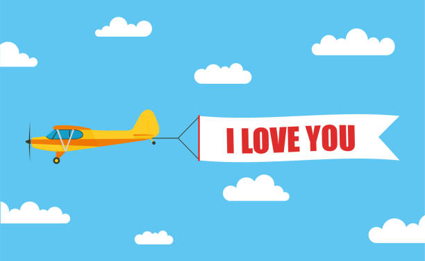 istock Flying advertising banner, pulled out by light aircraft with the inscription 