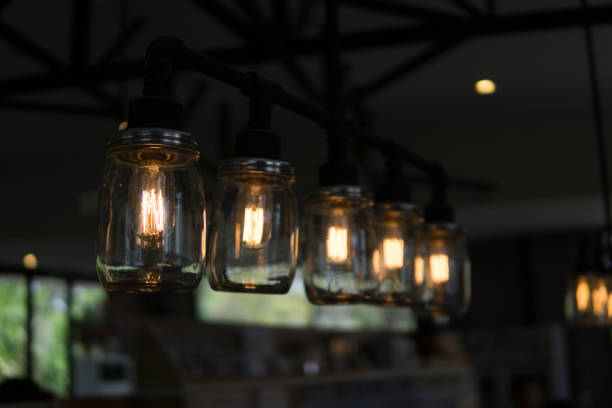 istock edison light bulbs style hanging on the ceiling for decorated in antique style. idea concept. 943347744