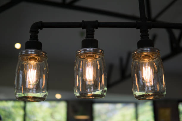 istock edison light bulbs style hanging on the ceiling for decorated in antique style. idea concept. 943347752