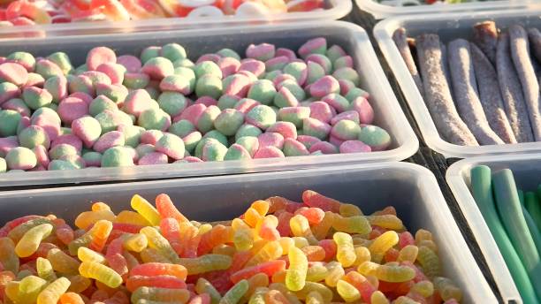 istock Plastic box with jelly sweets in candy shop 943355950