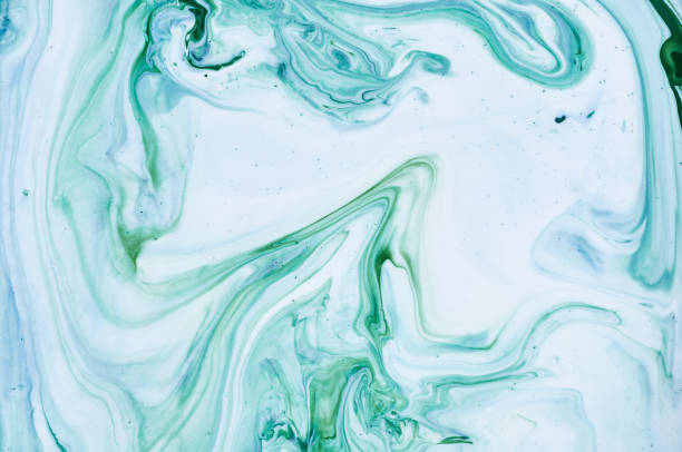 istock Fluid Art. Abstract colorful background, wallpaper, texture. Mixing  paints. Modern art. Marble texture 943359452