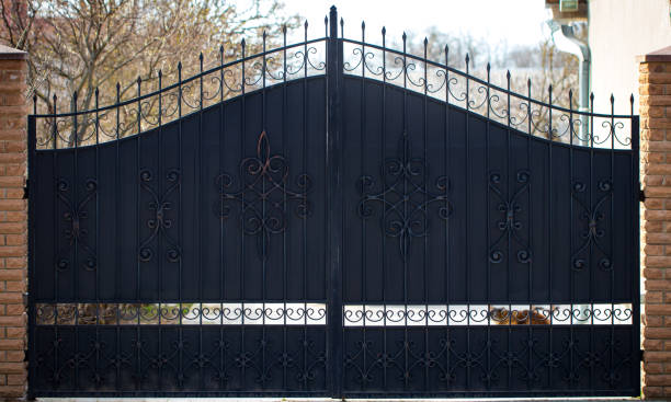 istock wrought-iron gates, ornamental forging, forged elements close-up 943365020