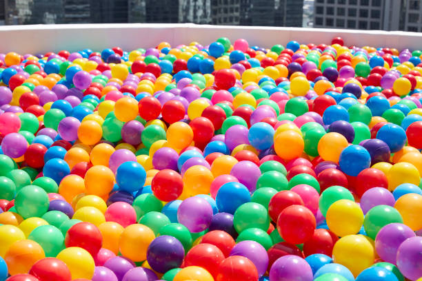 istock Colorful plastic balls playground outdoor 943372128