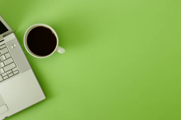 istock Top view of office desk with coffee and accessories 943372242
