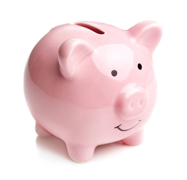 istock single pink piggy bank isolated on white background 943372674