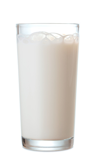 single glass of fresh milk isolated on white background