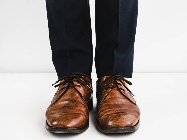 istock Stylish shoes and blue trousers 943388020