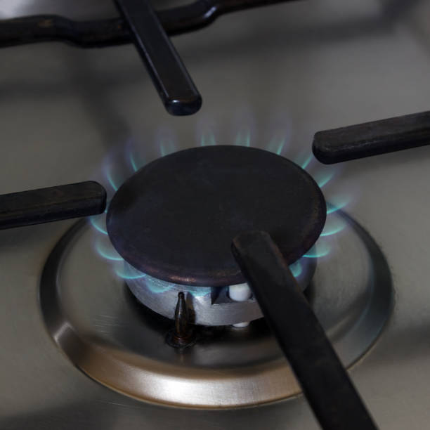 istock Gas burner flame at gas stove, close-up. 943388108