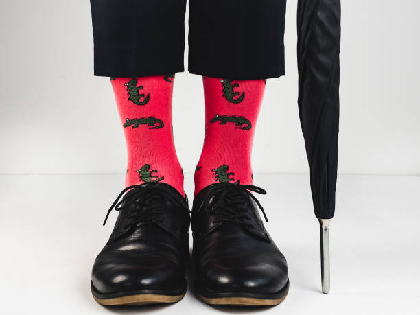 istock Stylish shoes and bright socks 943388918