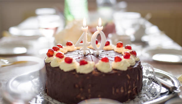 istock Happy 40th birthday cake on table 943388960