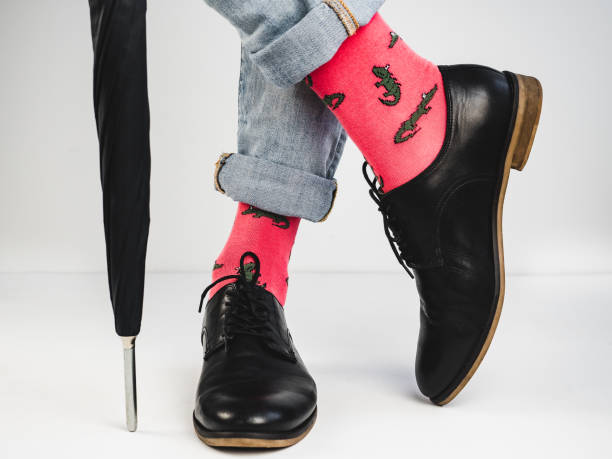 istock Stylish shoes and bright socks 943388992