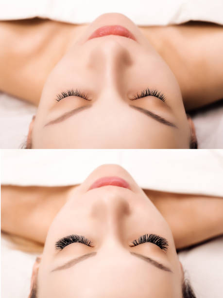 istock Eyelash Extension Procedure. Woman Eye with Long Eyelashes. Close up, selective focus 943394108