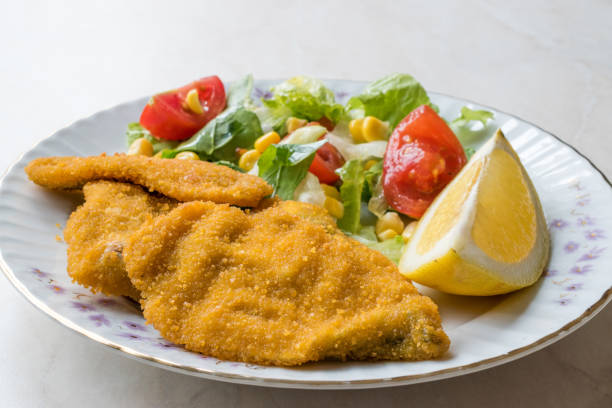 istock Fried Crispy Sardine Fish Plate with Salad and Lemon / Seafood Sardalya 943400448