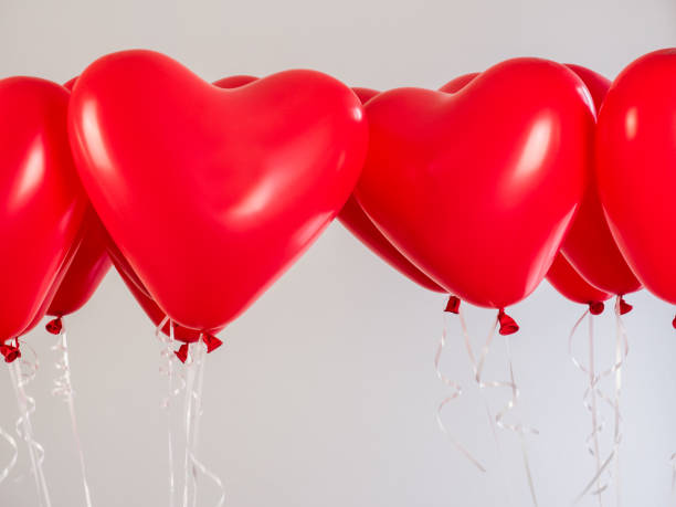 istock Red balloons in the shape of a heart 943404564