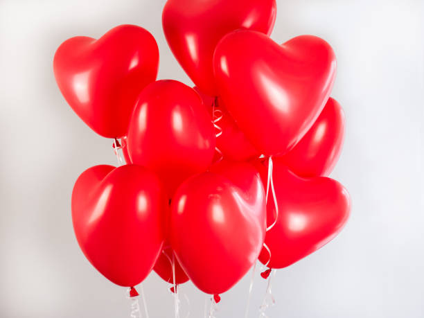 istock Red balloons in the shape of a heart 943404818