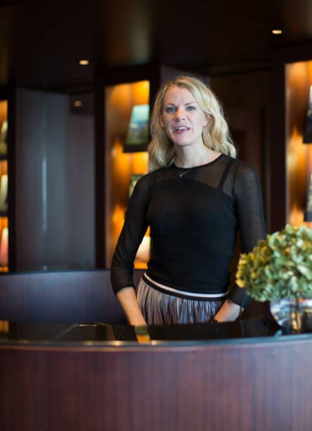 istock An Pretty Woman Talking and Greeting in Nice Luxury Setting 943405838