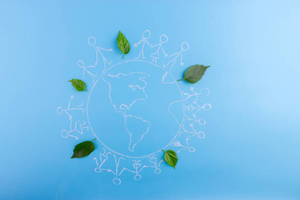 istock group of people on the earth 943409062