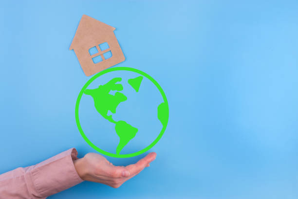 istock Paper cut of eco house 943410474