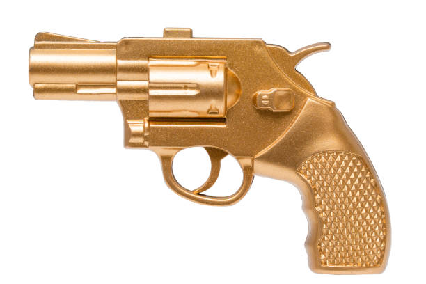 istock Golden toy gun 943411572