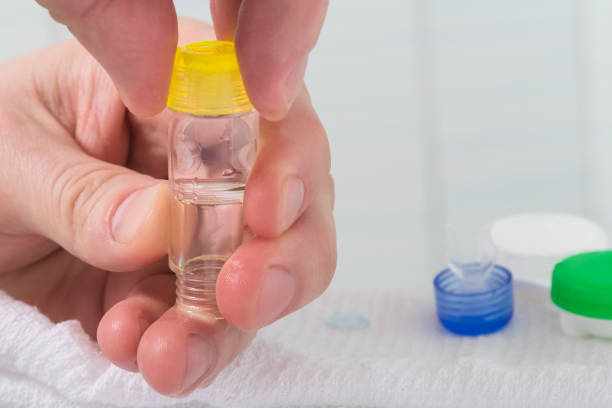istock fingers open an empty container for storing lenses, close-up 943411824