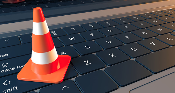 3D Rendering Of Realistic Laptop Keyboard Closeup With Traffic Cone