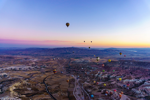 istock Hot air balloons flying over spectacular Cappadocia 943421054