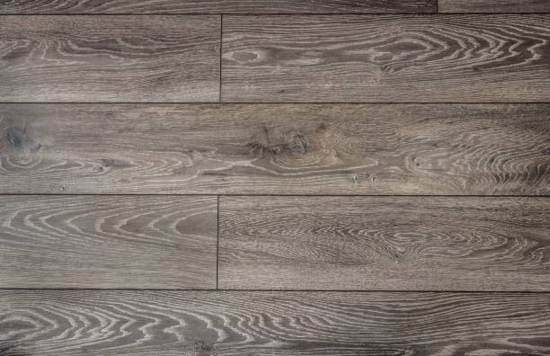 istock Grey textured wooden plank background 943430852